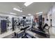 Well-equipped fitness center with a variety of weight machines and mirrors at 4115 Falls Ridge Dr, Johns Creek, GA 30022