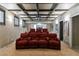 Home theater with tiered seating for movie nights at 4115 Falls Ridge Dr, Johns Creek, GA 30022
