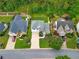 An aerial view of a well-maintained home with lush landscaping and a concrete driveway at 4206 Moccasin Trl, Woodstock, GA 30189
