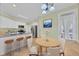 Bright kitchen and nook with granite countertops, stainless steel appliances, and views to yard at 4206 Moccasin Trl, Woodstock, GA 30189