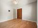 Cozy bedroom with hardwood floors, a ceiling fan, and a closet at 7025 Stone Wood Nw Dr, Kennesaw, GA 30152