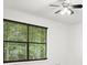 Bedroom featuring blinds and a ceiling fan at 7025 Stone Wood Nw Dr, Kennesaw, GA 30152