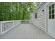 A large deck and outdoor living space enhances this home's exterior at 7025 Stone Wood Nw Dr, Kennesaw, GA 30152