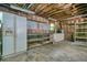 Unfinished garage space ready for customization with storage and utility hookups at 7025 Stone Wood Nw Dr, Kennesaw, GA 30152
