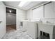 Bright laundry room with new appliances and sink, plus bonus area at 7025 Stone Wood Nw Dr, Kennesaw, GA 30152