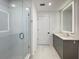 This bathroom has a stand up shower, gray cabinets, and a large mirror at 788 W Marietta Nw St # 512, Atlanta, GA 30318