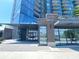 Modern condominium building entrance with glass windows and brick accents at 788 W Marietta Nw St # 512, Atlanta, GA 30318