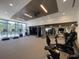 Well-equipped gym with treadmills and stationary bikes with ceiling with modern wood decor at 788 W Marietta Nw St # 512, Atlanta, GA 30318