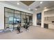 Modern gym area with weight equipment, fitness machines and water cooler station at 788 W Marietta Nw St # 512, Atlanta, GA 30318