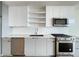 Sleek kitchen with stainless steel appliances, subway tile backsplash, and modern cabinets at 788 W Marietta Nw St # 512, Atlanta, GA 30318