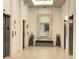 Elegant lobby area with neutral tones, seating, and accent mirror decor at 788 W Marietta Nw St # 512, Atlanta, GA 30318