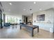 Resident lounge with a full-size pool table, modern fireplace, and comfortable seating at 788 W Marietta Nw St # 512, Atlanta, GA 30318