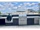 Outdoor kitchen and grilling area with stainless steel appliances and counter space at 788 W Marietta Nw St # 512, Atlanta, GA 30318