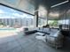 Expansive outdoor patio with modern lounge seating, pool, and scenic views at 788 W Marietta Nw St # 512, Atlanta, GA 30318