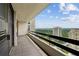 View from a tiled balcony with black railings overlooking the city at 2660 Peachtree Nw Rd # 23A, Atlanta, GA 30305