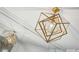 Close-up of a modern geometric chandelier reflected in the mirrored wall, highlighting elegant lighting design at 2660 Peachtree Nw Rd # 23A, Atlanta, GA 30305