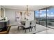 Formal dining room with skyline views at 2660 Peachtree Nw Rd # 23A, Atlanta, GA 30305