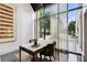 Bright home office featuring a modern desk, large windows, and marble floors at 2660 Peachtree Nw Rd # 23A, Atlanta, GA 30305