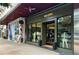 Todd Snyder storefront with mannequins and storefront-spanning artistic images creating a chic retail setting at 2660 Peachtree Nw Rd # 23A, Atlanta, GA 30305