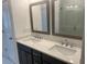 Bathroom featuring double sinks, modern fixtures, and clean design at 358 Olmstead Way # 25, Alpharetta, GA 30022