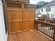 Wooden deck with a privacy screen and railing overlooking the neighborhood at 358 Olmstead Way # 25, Alpharetta, GA 30022