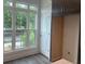 Sunlit eat-in kitchen nook with large window and storage at 358 Olmstead Way # 25, Alpharetta, GA 30022