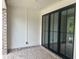 Private patio area with brick accents, perfect for relaxing or entertaining outdoors at 358 Olmstead Way # 25, Alpharetta, GA 30022
