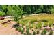 Scenic pond surrounded by lush landscaping at 358 Olmstead Way # 25, Alpharetta, GA 30022