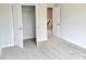 Bedroom with an open closet and neutral carpet at 4849 Walkers Green, Mableton, GA 30126