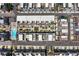 Birds eye view of modern townhome community with a pool, landscaping, and rooftop terraces at 1244 Chelsea Nw Cir, Atlanta, GA 30318