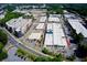 Aerial image of the community showcasing its diverse shops, apartments, and tree-lined streets at 1244 Chelsea Nw Cir, Atlanta, GA 30318