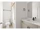 Clean, modern bathroom with a combination tub and shower, with neutral color palette at 1244 Chelsea Nw Cir, Atlanta, GA 30318
