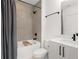 Bathroom featuring a shower and tub with modern fixtures, vanity with white countertop at 1244 Chelsea Nw Cir, Atlanta, GA 30318