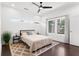 Well-lit bedroom with a ceiling fan, a window, and modern decor at 1244 Chelsea Nw Cir, Atlanta, GA 30318
