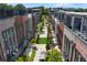 Landscaped walkway in a luxury townhome community with modern exteriors and outdoor spaces at 1244 Chelsea Nw Cir, Atlanta, GA 30318