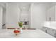 Bright, modern kitchen with white countertops, seating and adjacent coffee bar area at 1244 Chelsea Nw Cir, Atlanta, GA 30318