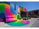 Colorful mural with seating area and outdoor dining, perfect for community gatherings at 1244 Chelsea Nw Cir, Atlanta, GA 30318