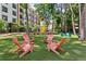 Inviting outdoor space with colorful seating area, nestled amidst a green landscape at 1244 Chelsea Nw Cir, Atlanta, GA 30318