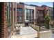 Cozy balcony with a grill, dining set, and stylish outdoor rug perfect for entertaining or relaxation at 1244 Chelsea Nw Cir, Atlanta, GA 30318