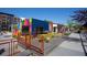 Outdoor dining area with colorful mural and seating, perfect for enjoying a meal at 1244 Chelsea Nw Cir, Atlanta, GA 30318