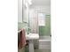 Classic bathroom with a pedestal sink and shower-tub combination at 1597 Fama Ne Dr, Atlanta, GA 30329
