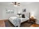 Bright bedroom offers natural light and wood floors, creating a relaxing space at 1597 Fama Ne Dr, Atlanta, GA 30329