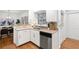 Bright kitchen features stainless steel appliances and leads to a dining area at 1597 Fama Ne Dr, Atlanta, GA 30329