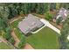 Sprawling property showcasing lush landscaping, a private backyard, and a long driveway at 208 Wilshire Ter, White, GA 30184