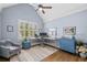Well-lit home office featuring vaulted ceilings, a large window, and an adjustable standing desk at 208 Wilshire Ter, White, GA 30184