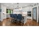 Beautiful kitchen featuring an island, granite countertops, and custom cabinetry at 208 Wilshire Ter, White, GA 30184