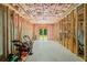 Large unfinished basement with framed walls and access to the backyard, ready for customization at 208 Wilshire Ter, White, GA 30184