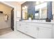 Stylish bathroom features double sinks, elegant lighting and a walk-in closet at 392 Pratt Dr # 2014, Atlanta, GA 30315