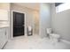 Clean bathroom with shower, vanity, toilet and a towel stand at 392 Pratt Dr # 2014, Atlanta, GA 30315