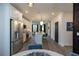Open-concept kitchen with stainless steel appliances, island seating, and view to living area at 392 Pratt Dr # 2014, Atlanta, GA 30315